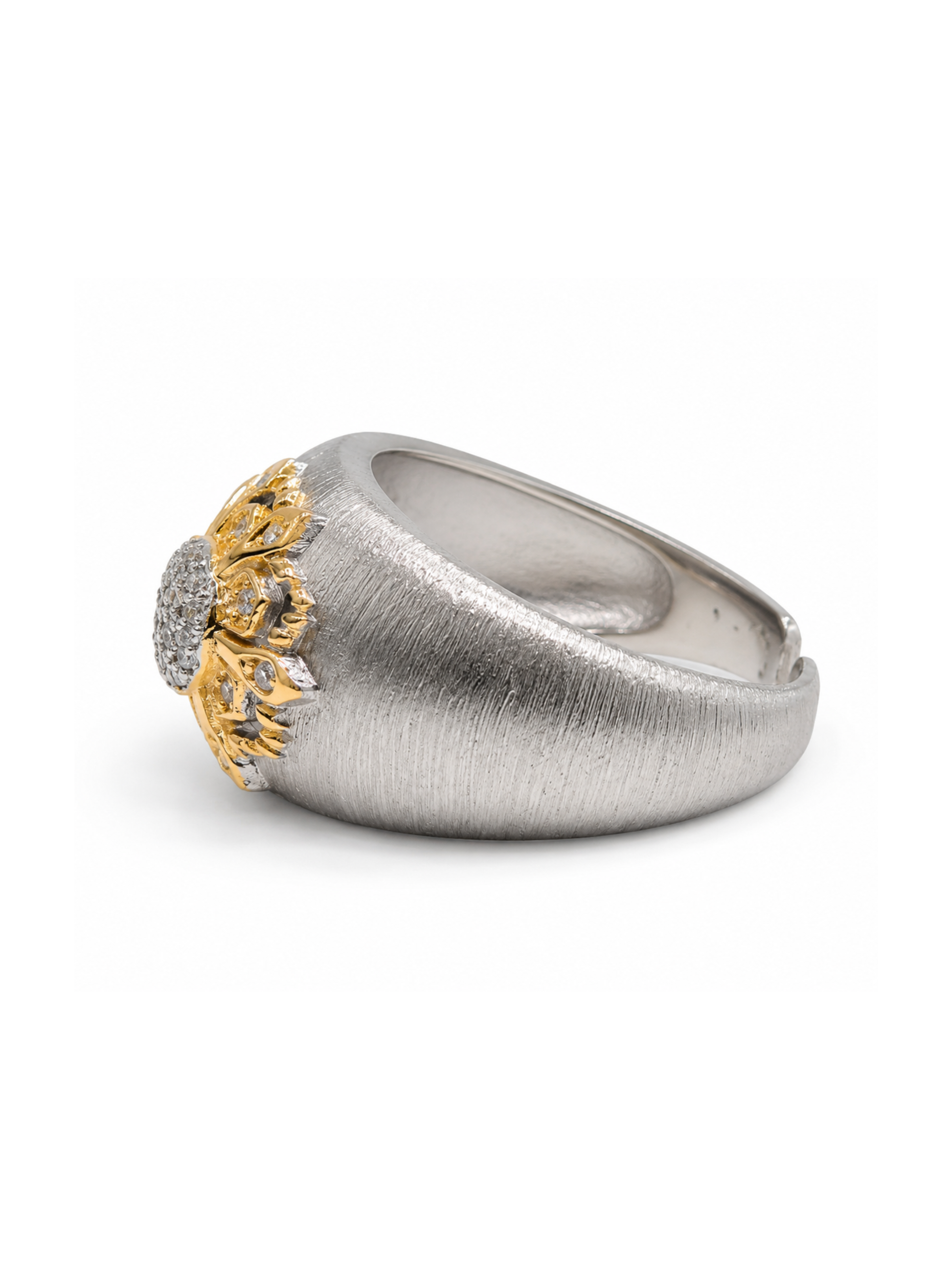 Silver ring with gold and diamond accents on a white background